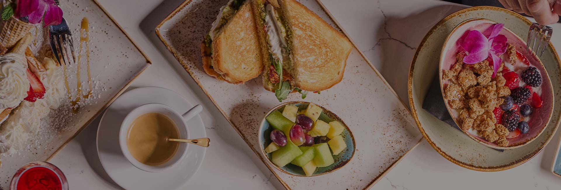 Table of lunch sandwiches and brunch entrees at ERA Cafe. Table of lunch sandwiches and brunch entrees at ERA Cafe.