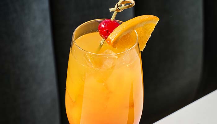 ERA Cafe in Waunakee, WI A glass of orange cocktail, perfect for Cocktails & Mimosas in Waunakee Wisconsin.