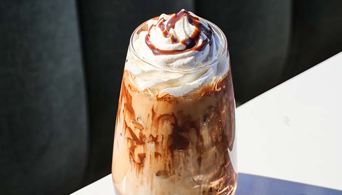 ERA Cafe in Waunakee, WI Iced coffee topped with whipped cream, a favorite among Espresso & Coffee Drinks in Waunakee.