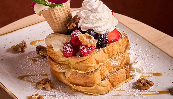 ERA Cafe in Waunakee, WI Stacked French toast—berries, walnuts, and cream—serving the Best Breakfast in Waunakee Wisconsin.