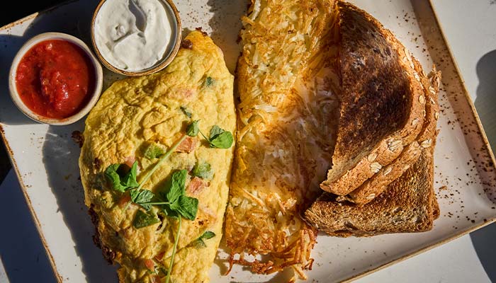 ERA Cafe in Waunakee, WI Enjoy the best breakfast in Waunakee, Wisconsin: omelette, hash browns, toast, salsa & sour cream.