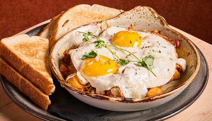 ERA Cafe in Waunakee, WI A bowl of hash and eggs with toasted bread—truly the Best Breakfast in Waunakee Wisconsin.