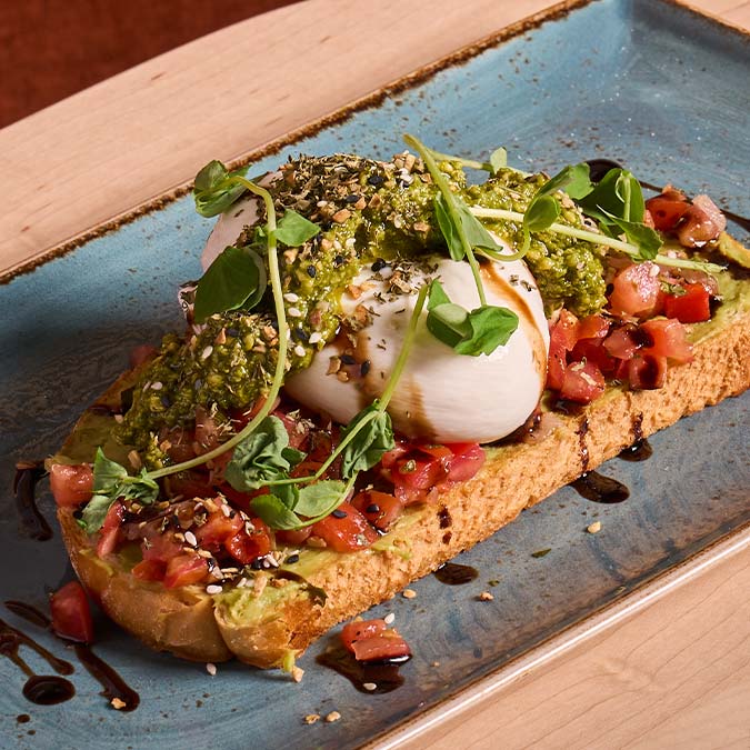 ERA Cafe in Waunakee, WI Avocado toast with burrata, tomato, and pesto—perfect for Breakfast Brunch & Lunch in Waunakee.